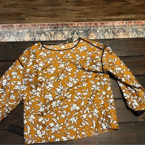 Tory Burch 2 piece set. Wrap skirt and long sleeve shirt. Material: silk.